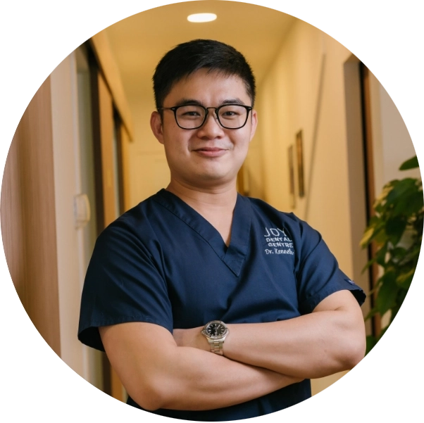 Dr Kenneth Lwi Zhen Yu at Joy Dental.